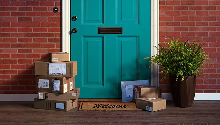 door with pile of packages in front of it